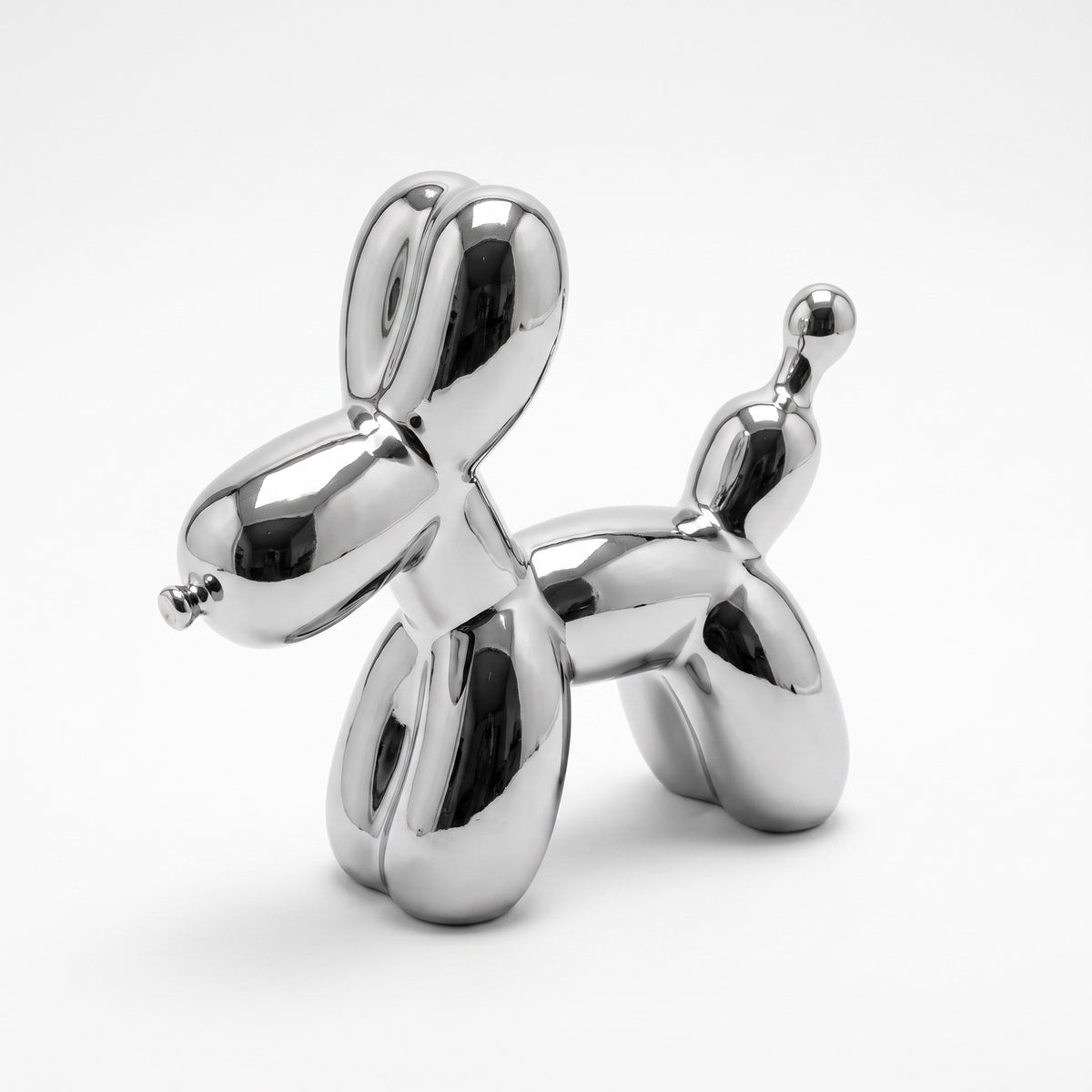 Silver Balloon Dog Sculpture — front view on white background