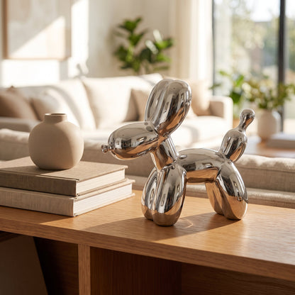 Silver Balloon Dog Sculpture styled on a console shelf