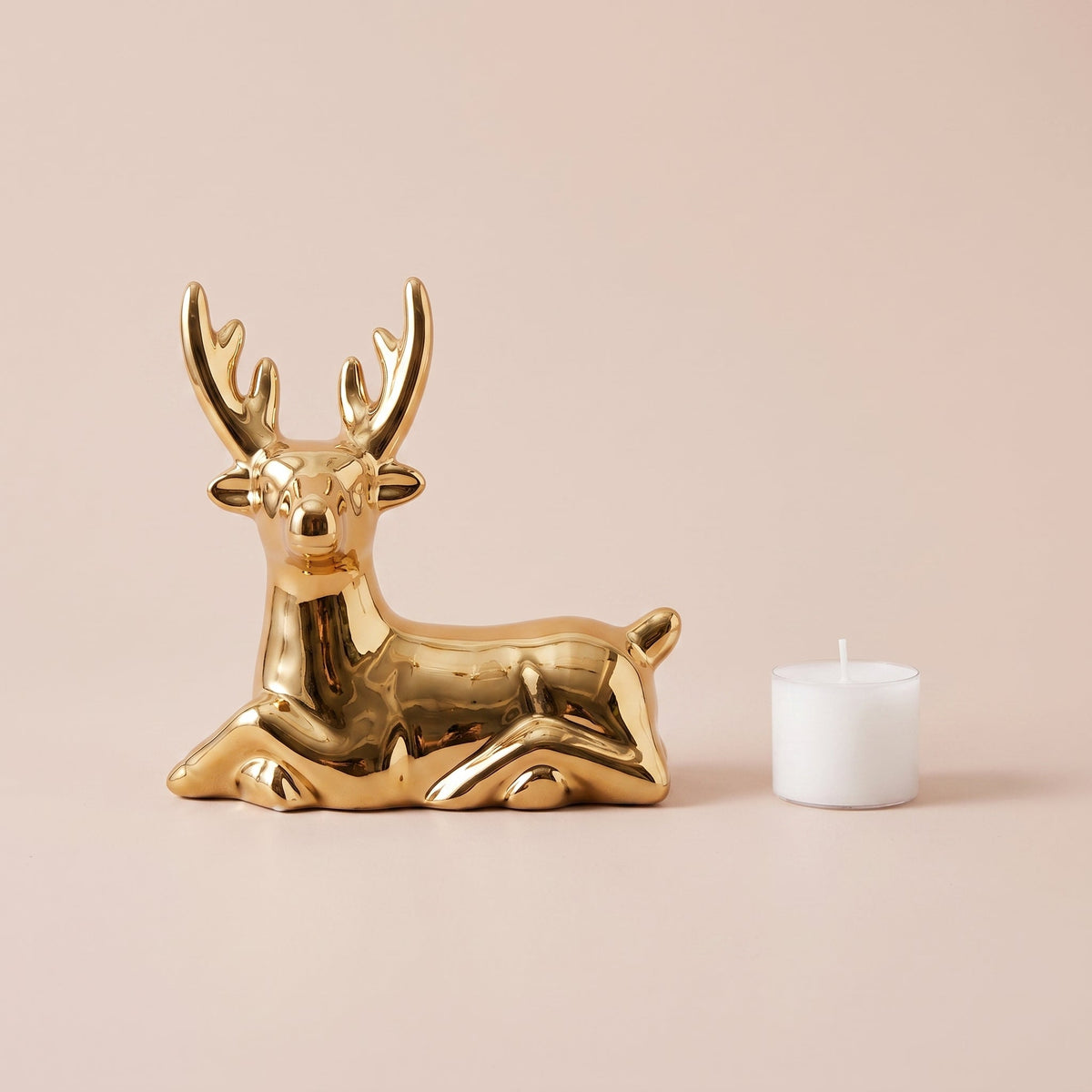 Regal Golden Stag Sculpture Regular side profile with a tealight for scale