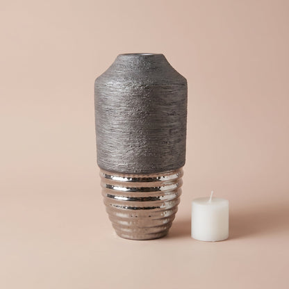 Graphite Luxe Vase side profile shown with a tealight candle for scale