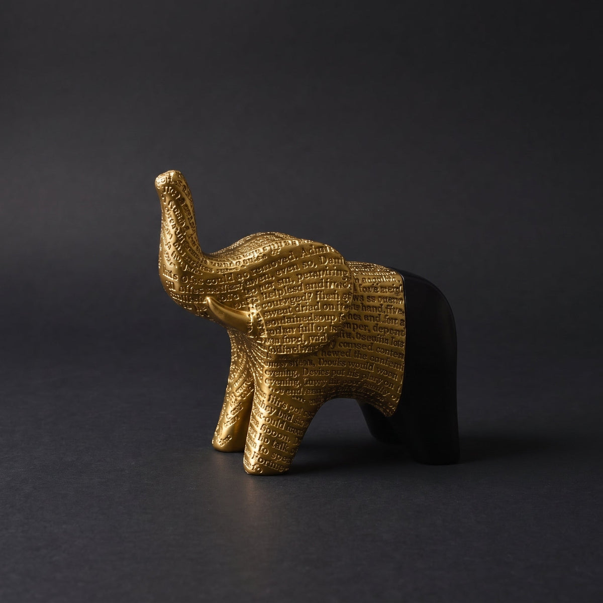 Dual-Tone Textured Elephant Figurine — full view on dark background