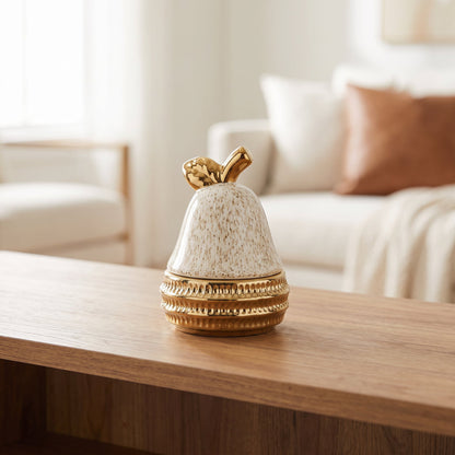 Golden Pear Decorative Accent styled on a console shelf
