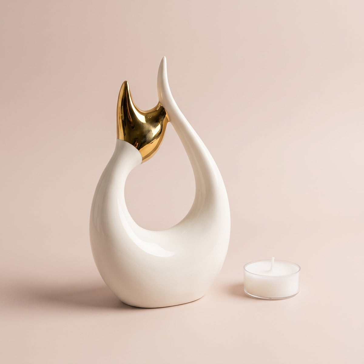 Aurelia Abstract Sculpture shown with a tealight candle for scale