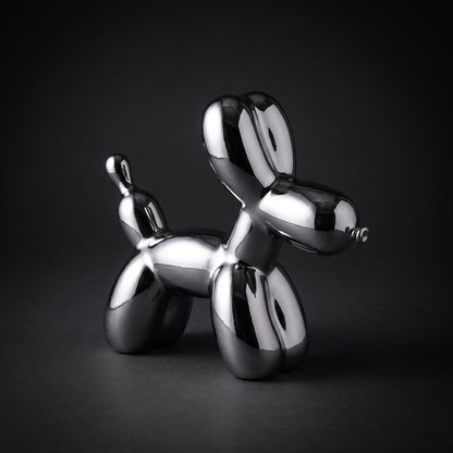 Silver Balloon Dog Sculpture — full view on dark background