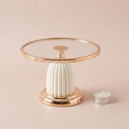 Ivory Luxe Cake Display Stand Regular shown with a tealight candle for scale