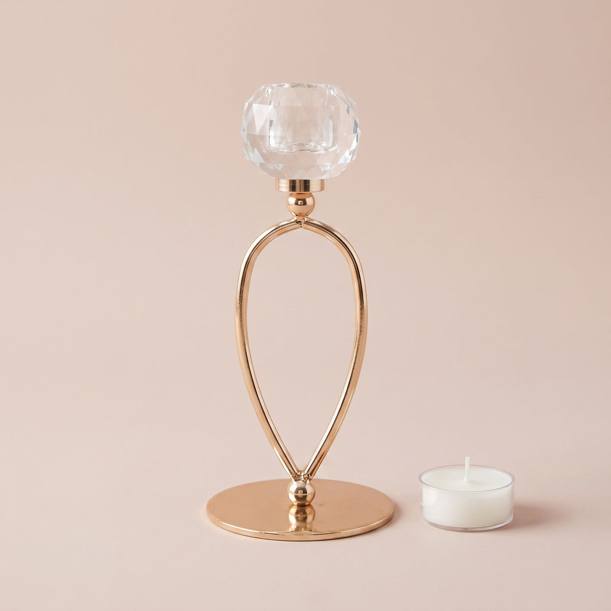 Infinity Crystal Candle Holder Tall shown with a tealight candle for scale