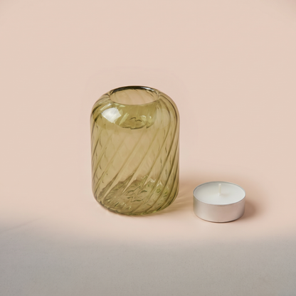 Olive Swirl Glass Candle Holder Regular shown with a tealight candle for scale