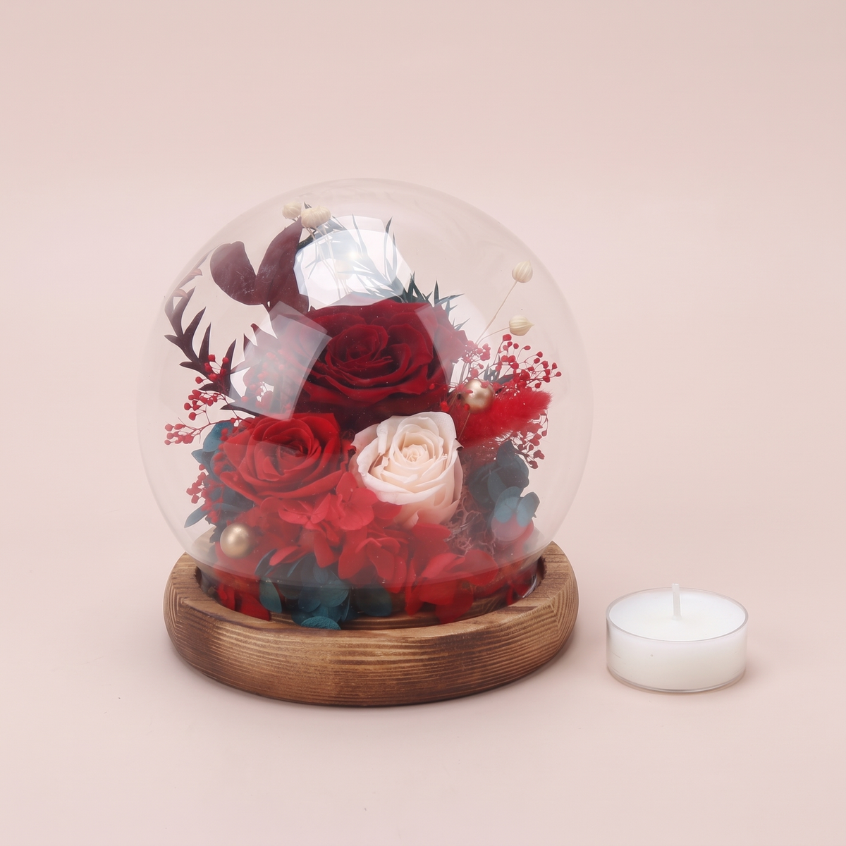 Crimson Eternal Rose Dome shown with a tealight candle for scale